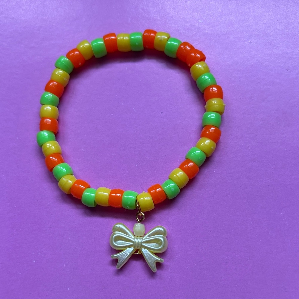 Colorful Beaded Bracelet with Bow Charm